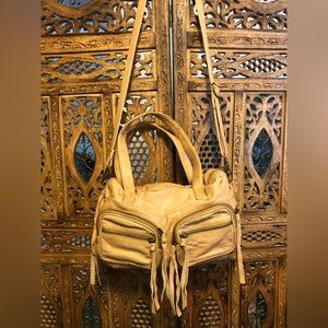 Day & Mood purse.  Lots of zip pockets and great for travel.